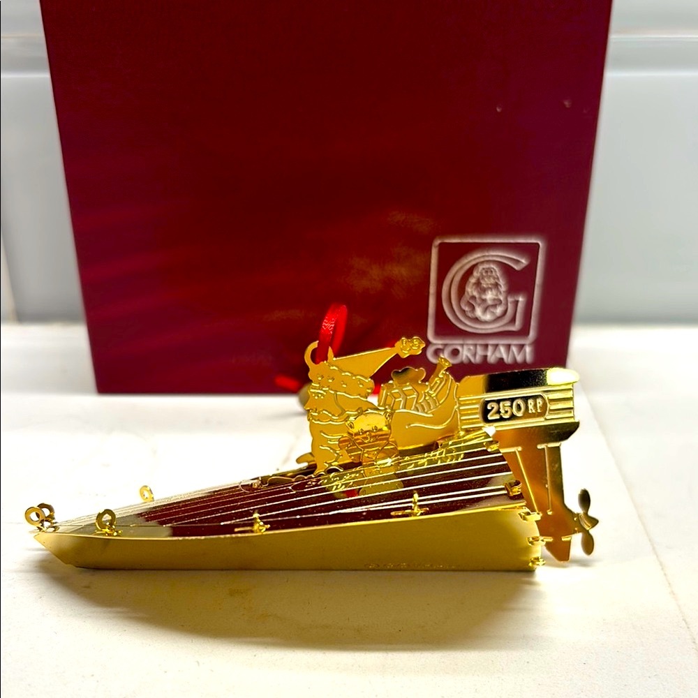 Gorham Gold and Red Santa Motorboat Ornament